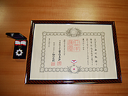 Medal and certificate